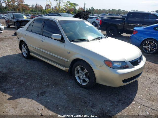  Salvage Mazda Protege